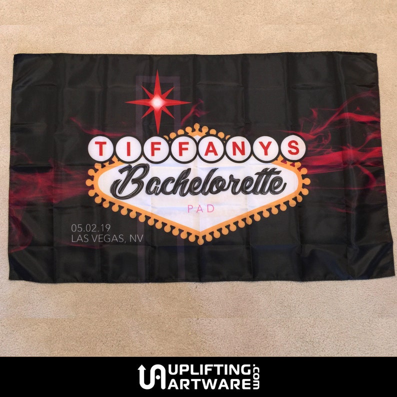 May include: Black and red Vegas-style sign with the text "Tiffany's Bachelorette" and the date "05.02.19 LAS VEGAS, NV".