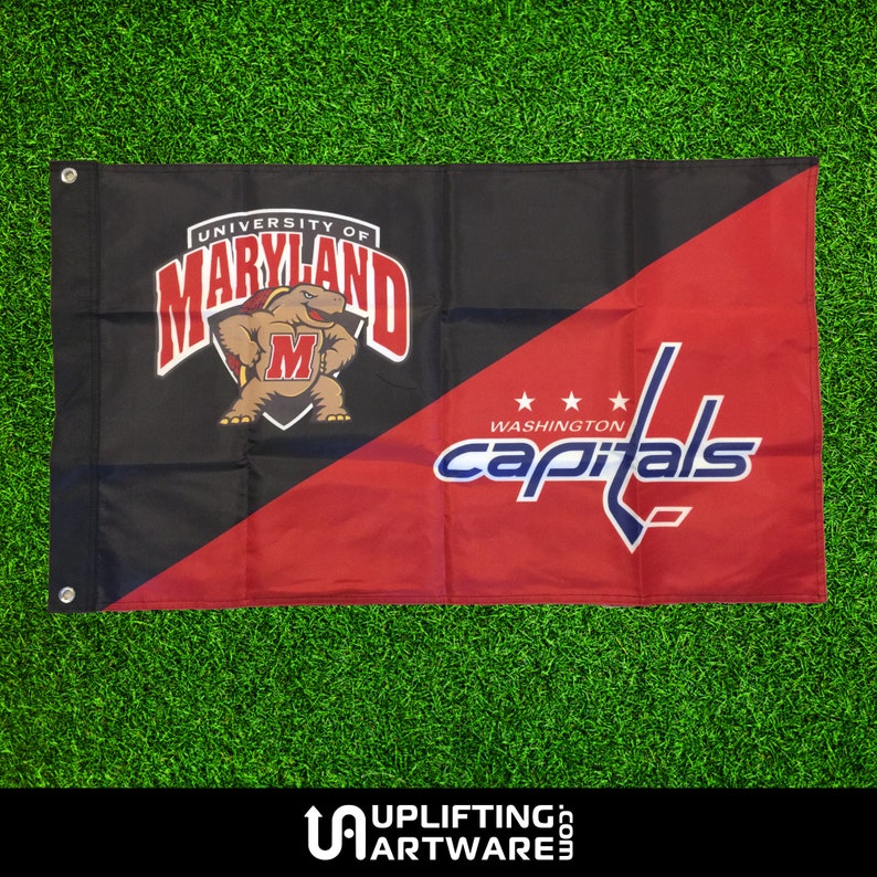 May include: A black and red flag with the University of Maryland Terrapins logo on one side and the Washington Capitals NHL team logo on the other side.