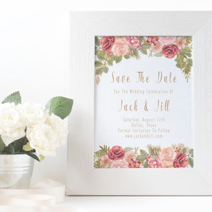 May include: Save the date card with a floral design. The card is white with gold text that reads "Save The Date" and "For The Wedding Celebration Of Jack & Jill". The text also includes the date "Saturday, August 12th", the location "Dallas, Texas", and the website "www.jackandjill.com".