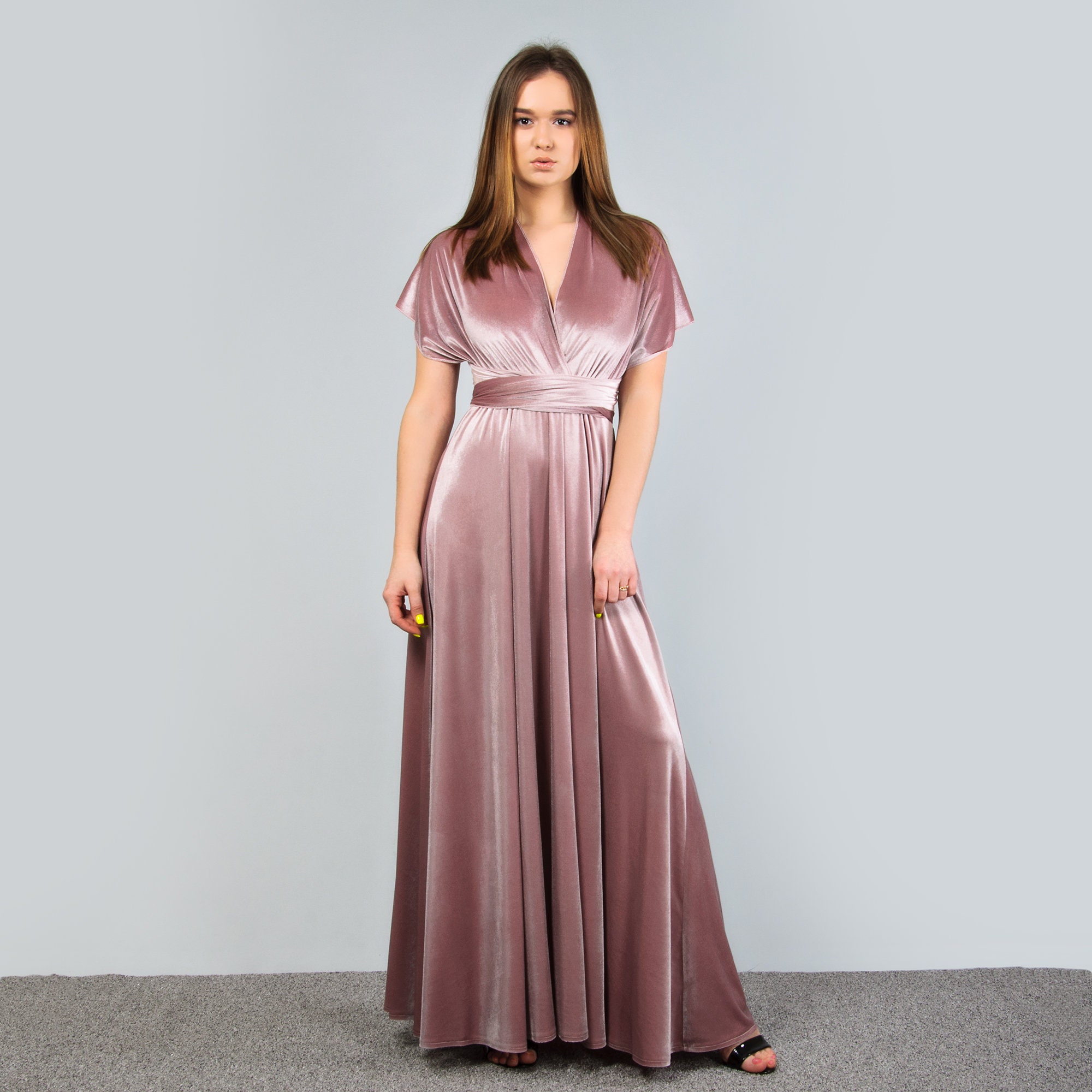 sachin and babi light blue dress Add flower buckles and watch the whole look change. Deep V halter tutorial  in Dusty Pink. Link in bio to shop. #infinitydress #modelchic #stylingreel  #bridesmaiddresses #weddingtok main image 0