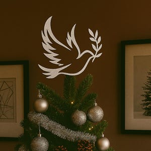 This peace dove ornament brings a graceful and symbolic touch to your decor, featuring a smooth cutout silhouette with an olive branch and a key‑style base that adds unique charm to Christmas trees, wall displays, or gift presentations while offering a meaningful reminder of hope, serenity, and handcrafted artistry.