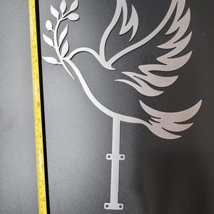 This silver dove tree topper honors the shared symbolism of peace cherished in both Christian and Jewish traditions—representing hope, renewal, and divine protection. Its graceful form and olive branch evoke the spirit of the season, making it a meaningful addition to interfaith celebrations and winter gatherings.. Valentine gift idea present.