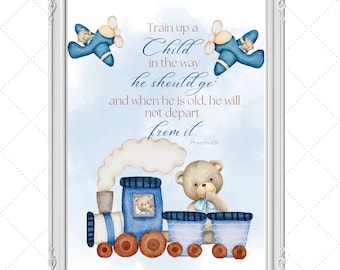 May include: A framed watercolor print featuring a blue train, teddy bear, and airplanes. The print includes the text "Train up a Child in the way he should go; and when he is old, he will not depart from it." Proverbs 22:6.