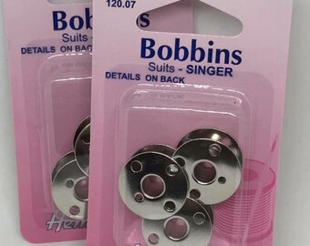 Sewing machine bobbins, Metal bobbin spares, Top load metal bobbins.