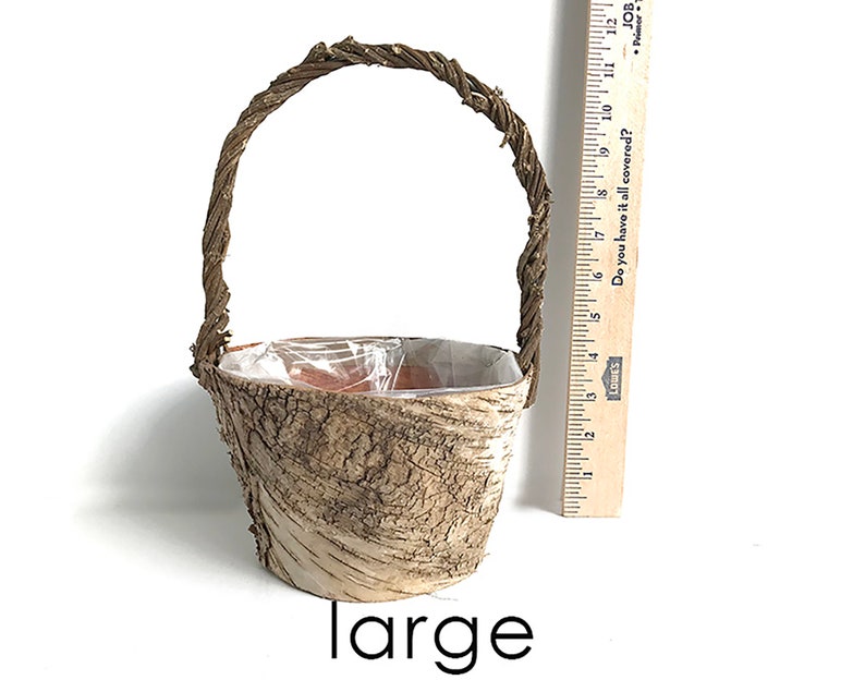May include: A large, brown, bark-covered planter with a woven handle. The planter is 6 inches tall and is labeled "large".