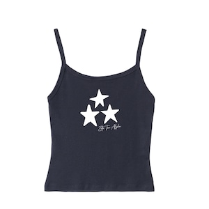 May include: A navy blue tank top with three white stars and the text "Zeta Tau Alpha" in white cursive.
