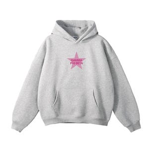 May include: A light gray hooded sweatshirt with a front pocket and a pink star graphic. The star contains the text "GAMMA PHI BETA". The sweatshirt has long sleeves and a hood.