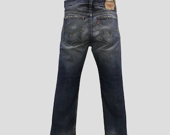 Vintage Levi’s 502 Men’s Denim Jeans W34 L32 Distressed Faded Blue Straight Leg Levi Strauss Red Tab Stone Washed Ripped Denim Jeans Size 34