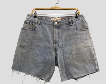 Vintage Levi's 550 licht gewassen denim jeans Levi Strauss ontspannen taps toelopende vervaagde blauwe jeans Levi's afgesneden korte denim jeans buiten moeder W32