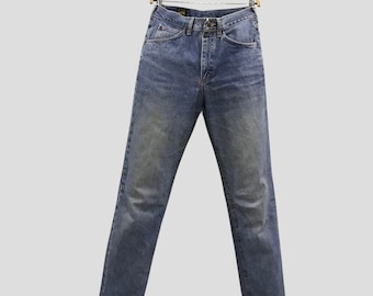 Jeans Lee vintage de los 90, hechos en EE. UU., mezclilla azul de lavado medio, pierna recta, cintura alta, 100 % algodón. Auténticos jeans Lee Riders de mezclilla de lavado claro.