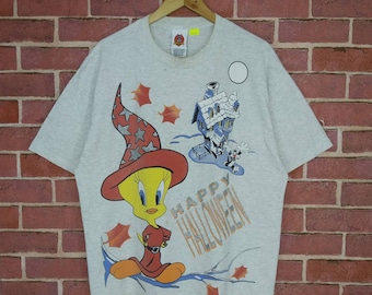 T-shirt med tecknad film från Warner Bros., 90-talsstil och Tweety-motiv.