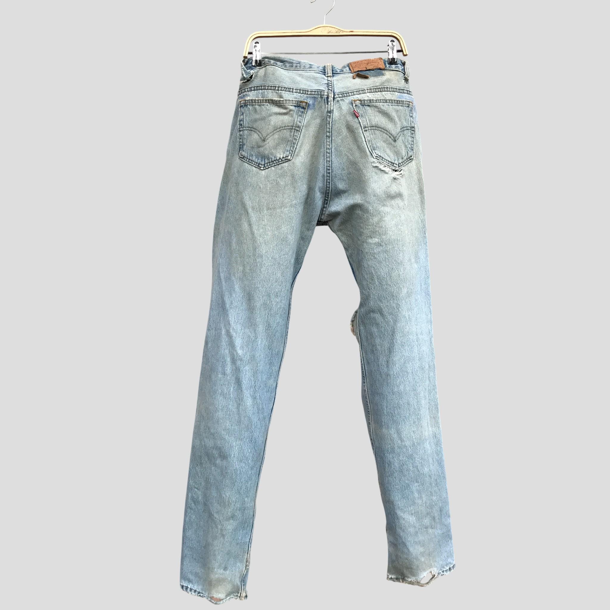 Vintage Levi's 501 Jeans Light Wash Distressed Ripped Knee Denim