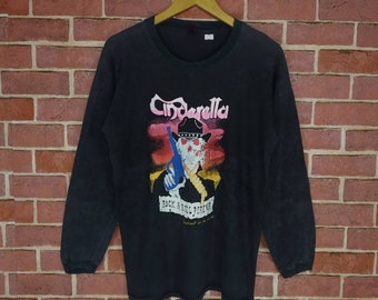 Camiseta de manga larga vintage desgastada con la banda de rock Cenicienta
