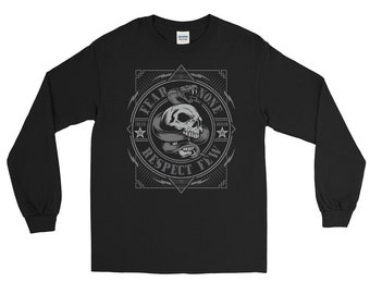 May include: Black long-sleeve t-shirt with a gray graphic design of a skull with a snake wrapped around it. The graphic has the text "Fear None Respect Few" with the words "Truth" and "Honor" in smaller text.