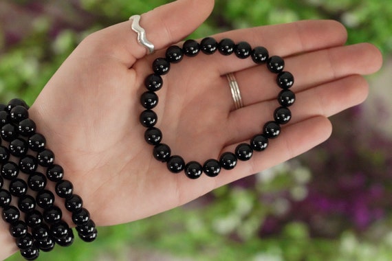 Buy Black Tourmaline Crystal Chip Bracelets / Protect Against All  Negativity / Encourages Optimism, Happiness, Good Luck / Reduces Pain &  Stress Online in India - Etsy