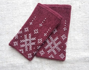 Handknitted  wrist warmers with beads.