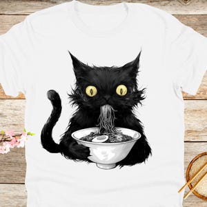 Anime Shirt Black Cat Eating Sushi, Unisex Tee for Anime Fans, Kawaii Japanese T-Shirt, Graphic Tee, Gift for Cat Lovers, Cool Top for Teens