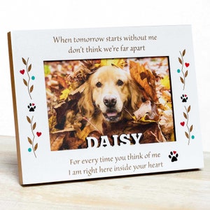 May include: White wooden photo frame with a picture of a golden retriever dog named Daisy. The frame has decorative elements of hearts, paw prints, and text that reads "When tomorrow starts without me don't think we're far apart" and "For every time you think of me I am right here inside your heart."