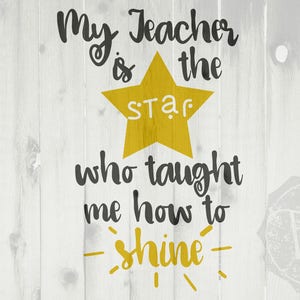 May include: A yellow star with the word "star" inside, with the text "My teacher is the star who taught me how to shine" on a white wood background.