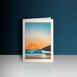 May include: Greeting card with a minimalist landscape design. The image shows a sunset over the sea, with an orange sun, blue water, and a small house on the beach. A person and dog are walking on the beach.