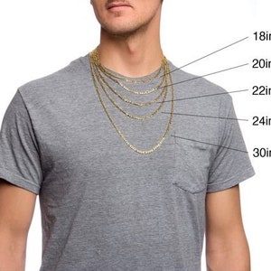 May include: A gold chain necklace with multiple lengths displayed on a model. The lengths are 18 inches, 20 inches, 22 inches, 24 inches, and 30 inches.