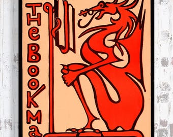 The Bookman Magazine Cover Page - A vibrant stylized dragon curls his tail around an eye level book