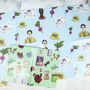 May include: Blue and green wrapping paper with a repeating pattern of characters from the TV show "The Office". The pattern includes images of beets, jelly, and the characters Michael Scott, Dwight Schrute, and Jim Halpert. The text "World's Best Boss" and "Dunder Mifflin" are also included in the pattern.
