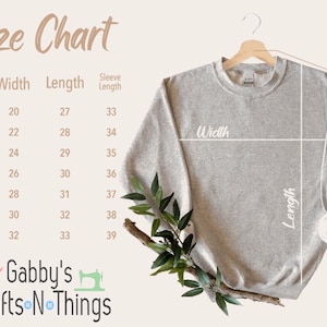 K&ouml;nnte beinhalten: Gr&ouml;&szlig;entabelle f&uuml;r einen grauen Pullover mit Ma&szlig;en in Zoll f&uuml;r Breite, L&auml;nge und &Auml;rmell&auml;nge. Die Tabelle zeigt die Gr&ouml;&szlig;en von S bis 4XL.