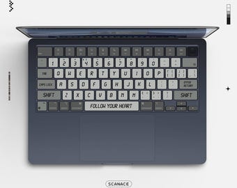キュートなピンクの蝶ネクタイ柄キーボードカバー。MacBook Pro 13