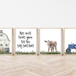 May include: Set of three framed prints with a farmhouse theme. The first print features a white barn with a brown door. The second print features the text "We will love you till the cows come home". The third print features a brown and white calf standing in a field of green grass.