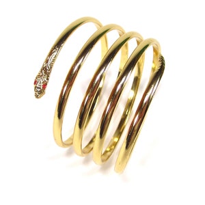 Gouden slangenarmband ca. 7 cm hoog, maat verstelbaar