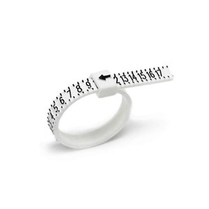 May include: White plastic ring sizer with black markings for measuring ring sizes from 4 to 17.