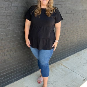 Black ruffle nursing top for breastfeeding mom