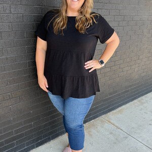 Black ruffle nursing top for breastfeeding mom