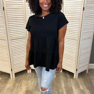 Black ruffle nursing top for breastfeeding mom