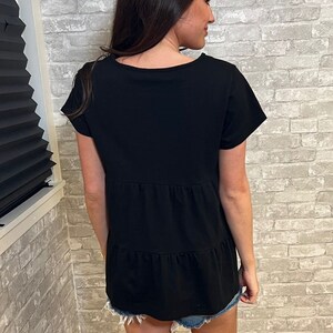 Black ruffle nursing top for breastfeeding mom