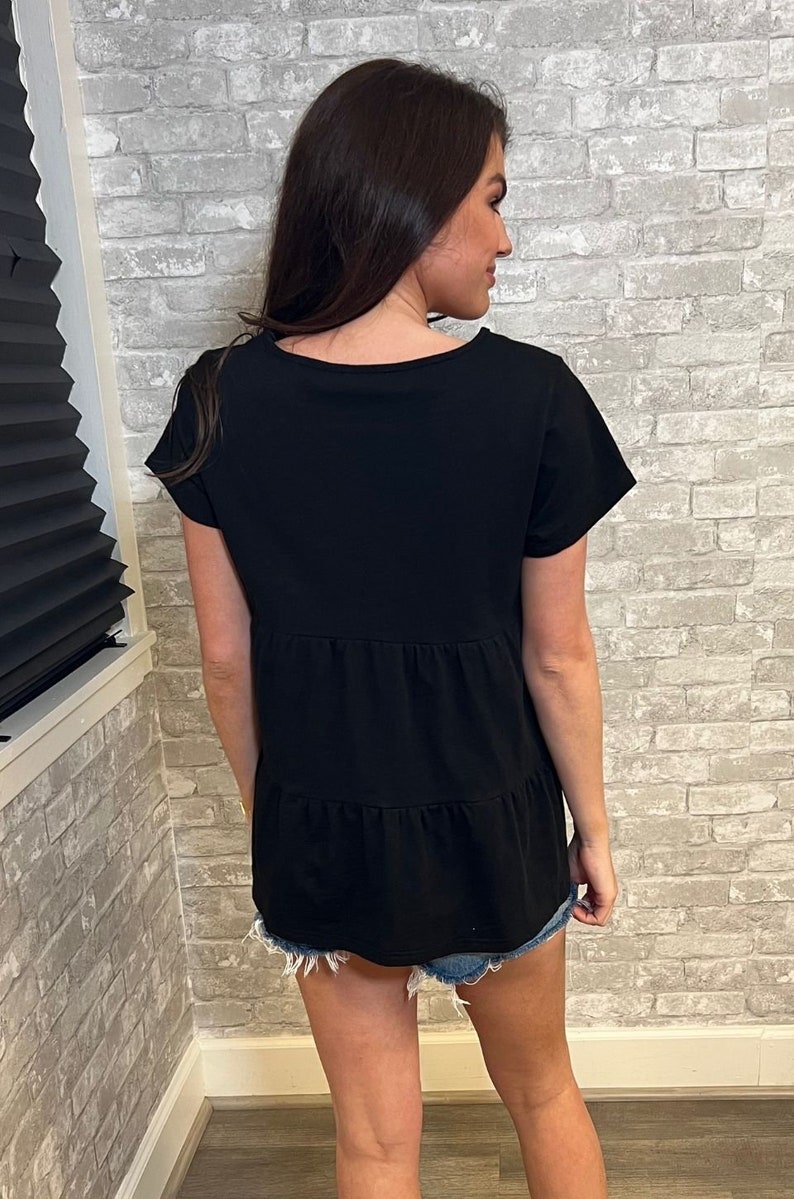 Black ruffle nursing top for breastfeeding mom