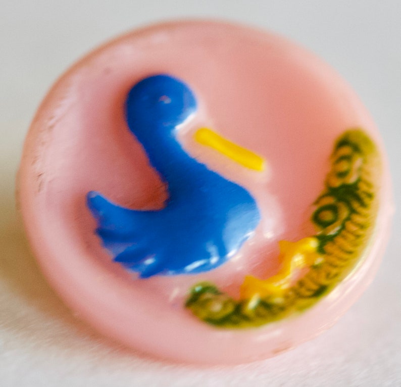 Blue Duck on Pink Glass