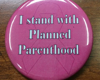 2 1/4" pinback button. I Stand With Planned Parenthood.