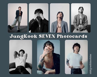 May include: A collection of seven black and white photocards featuring a person in various poses. The person is wearing different outfits, including a blazer, open shirt, and t-shirt. The text "Jungkook SEVEN Photocards" is displayed.