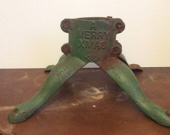 Antique cast iron Christmas tree stand from around 1931