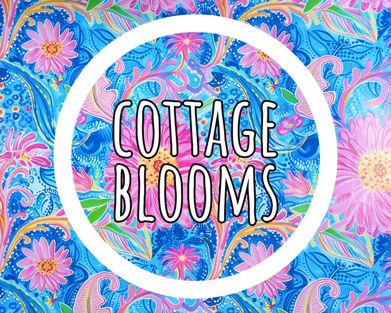 May include: A vibrant fabric pattern featuring pink daisy-like flowers, green leaves, and swirling blue paisley designs. A large white circle is centered over the pattern, containing the black text COTTAGE BLOOMS in a bold, sans-serif font.