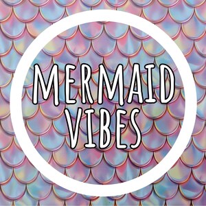 May include: A repeating pattern of iridescent, holographic fish scales in shades of pink, blue, and purple. Centered in the image is a white circular frame containing the black text MERMAID VIBES in a bold, sans-serif, outlined font.