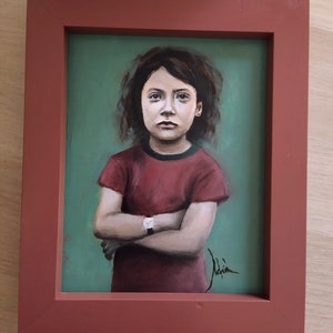 Oil painting. Portrait of a rebellious girl. Framed.