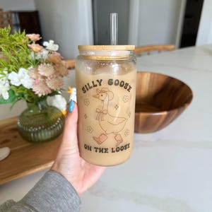 Silly Goose On The Loose Iced Coffee Glass Tumblr | 16 oz Glass Can With Lid And Straw | Funny Gifts | Cowboy Hat Glass | Unique Glass