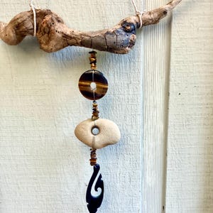 Tiger’s Eye Fish Hook Hagstone Wall Art