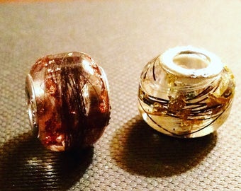 Pandora style resin bead containing pet hair/cremation ashes