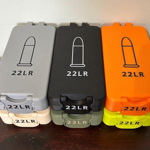 22 long rifle ammunition box, 120 round capacity.