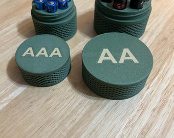 AA and AAA battery storage containers, capacity of 8 batteries each.