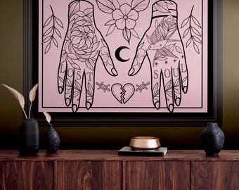 May include: A framed wall art print featuring a light pink background with black line art of two hands. The left hand is labeled LOST and the right hand is labeled SOUL. The design includes floral motifs, a crescent moon, a broken heart, and barbed wire.